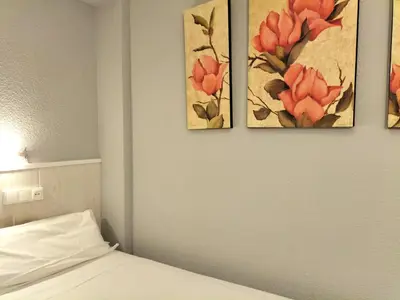 Cama o camas de una habitación en Hostal Albero by gaiarooms