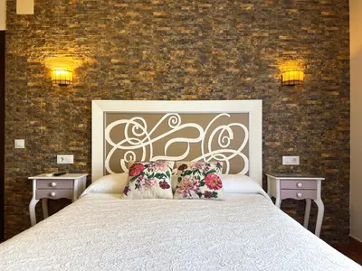 Cama o camas de una habitación en Casa Rural Aguas del Venero