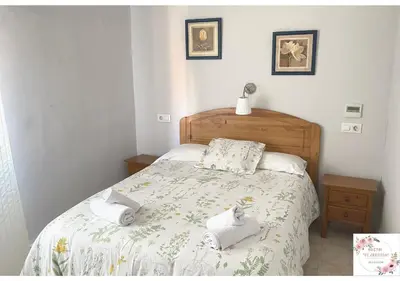 Cama o camas de una habitación en Hostal El Castillo