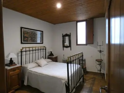 Cama o camas de una habitación en Casa Rural Abuela Isabel
