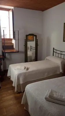 Cama o camas de una habitación en Casa Rural Abuela Isabel