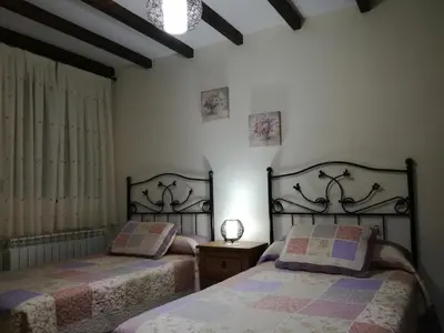Cama o camas de una habitación en Casa Rural Mirador del Valle