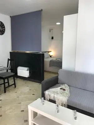 Zona de estar de Loft Arco del Cristo.