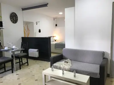 Zona de estar de Loft Arco del Cristo.