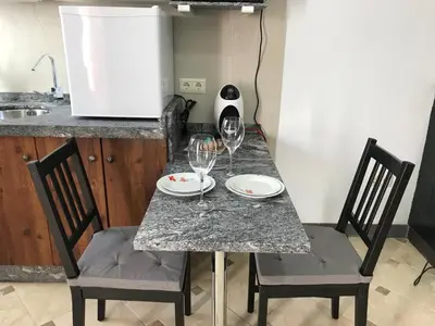 Una cocina o zona de cocina en Loft Arco del Cristo.