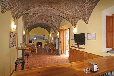 Una televisión o centro de entretenimiento en Apartamentos Villa Vacacional