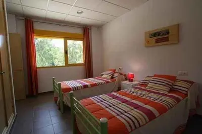 Cama o camas de una habitación en Apartamentos Villa Vacacional