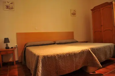 Cama o camas de una habitación en Casa Rural 
