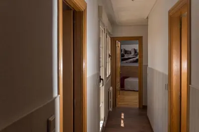 Cama o camas de una habitación en Panorama Ático