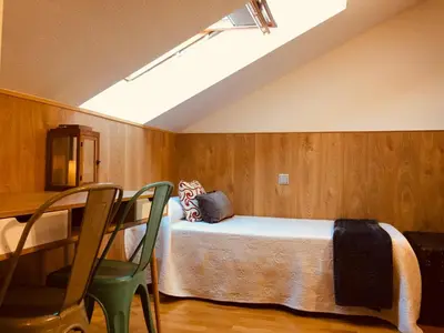 Cama o camas de una habitación en Panorama Ático