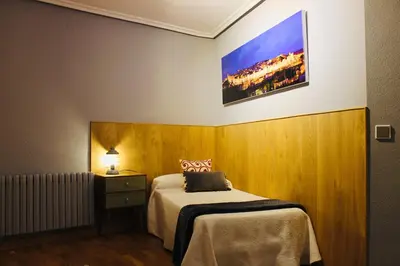 Cama o camas de una habitación en Panorama Ático