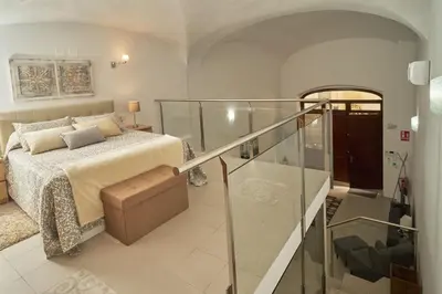Cama o camas de una habitación en Apartamento Turístico Centro Monumental -- Caceres