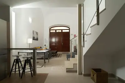 Zona de estar de Apartamento Turístico Centro Monumental -- Caceres