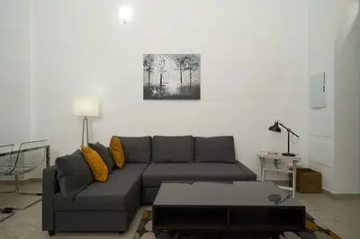 Zona de estar de Apartamento Turístico Centro Monumental -- Caceres
