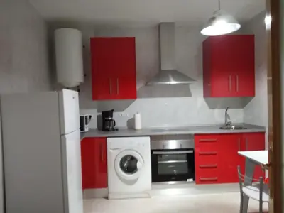 Una cocina o zona de cocina en Apartamento Turistico La Victoria