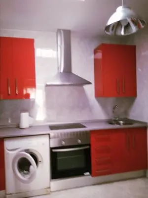 Una cocina o zona de cocina en Apartamento Turistico La Victoria
