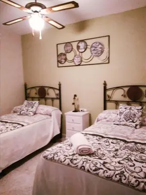 Cama o camas de una habitación en Apartamento Turistico La Victoria
