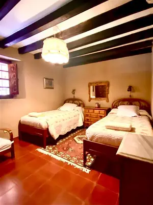 Cama o camas de una habitación en El huerto de Candeleda