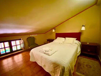 Cama o camas de una habitación en El huerto de Candeleda