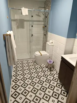 Un baño de Apartamentos AL-QAZERES LUXURY La Concepción