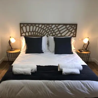 Cama o camas de una habitación en Apartamentos AL-QAZERES LUXURY La Concepción