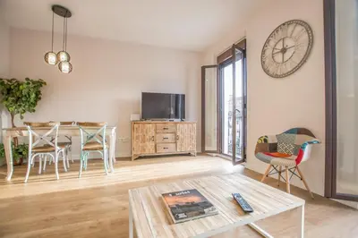 Una televisión o centro de entretenimiento en Apartamento Plaza Mayor Cáceres