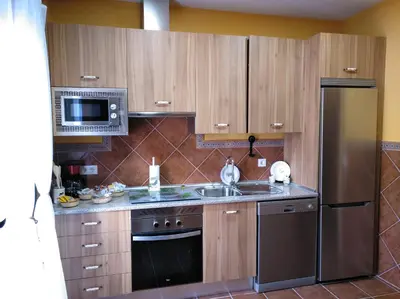 Una cocina o zona de cocina en Casa Rural La Santiaga