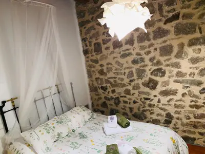 Cama o camas de una habitación en Casa Rural el Comercio Sierra de Francia