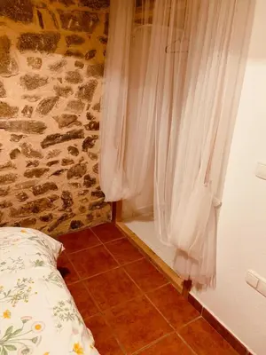 Cama o camas de una habitación en Casa Rural el Comercio Sierra de Francia