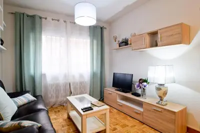 Una televisión o centro de entretenimiento en SWEET HOME ÁVILA