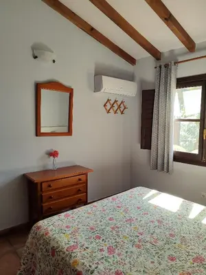 Cama o camas de una habitación en Apartamentos El Calambuco