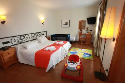 Cama o camas de una habitación en Hotel La Bodega
