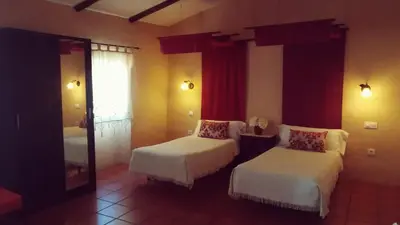 Cama o camas de una habitación en Casa Rural 