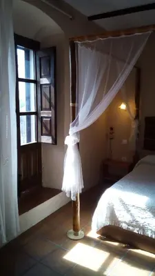 Cama o camas de una habitación en Casa Rural 