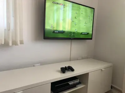 Una televisión o centro de entretenimiento en Casa Fuente Arriba