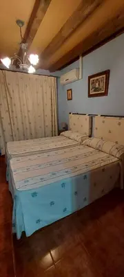 Cama o camas de una habitación en La Casa del Marques