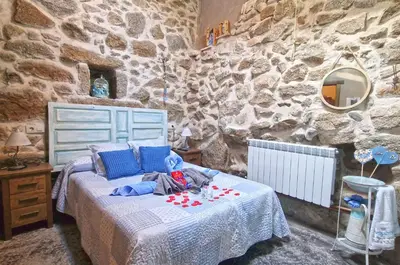 Cama o camas de una habitación en casa rural La Cuadra
