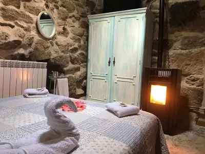 Cama o camas de una habitación en casa rural La Cuadra
