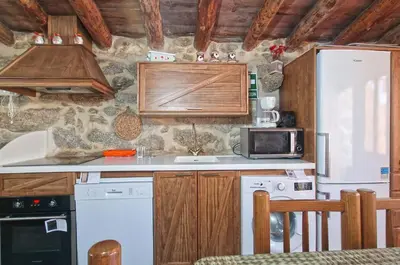 Una cocina o zona de cocina en casa rural La Fragua