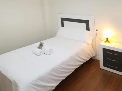Cama o camas de una habitación en Apartamento puente romano P2 1G