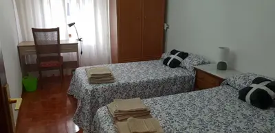 Cama o camas de una habitación en APARTAMENTOS SALAMANCA PUERTA ZAMORA, Centro, Wifi, 2 habitaciones, Parking