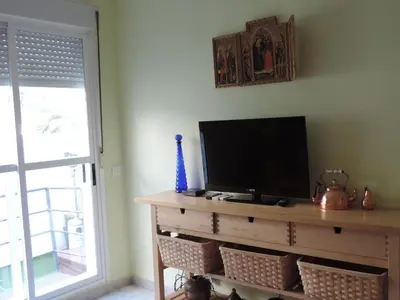 Una televisión o centro de entretenimiento en Apartamento Barbancho