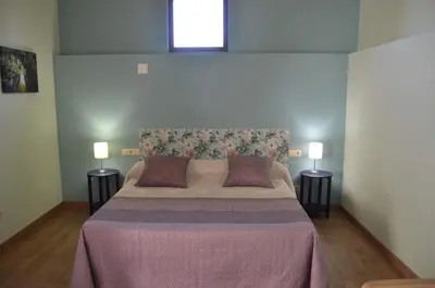 Cama o camas de una habitación en Casa Atenea