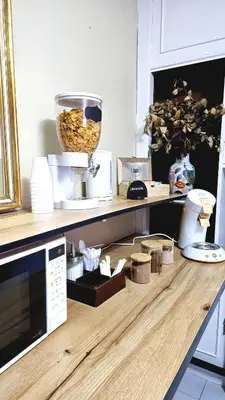 Una cocina o zona de cocina en Hostal La Rosa