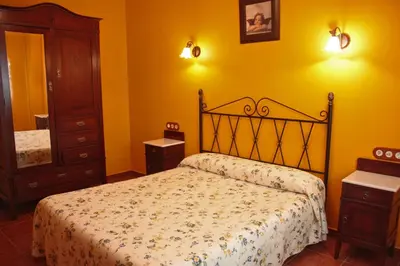 Cama o camas de una habitación en Apartamentos Trinidad