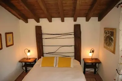 Cama o camas de una habitación en La Quinta Del Chocolatero