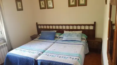 Cama o camas de una habitación en La Vista de Gredos III