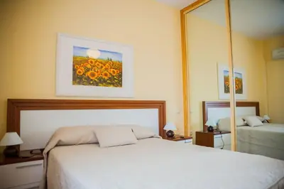 Cama o camas de una habitación en Apartamentos el Cardenillo
