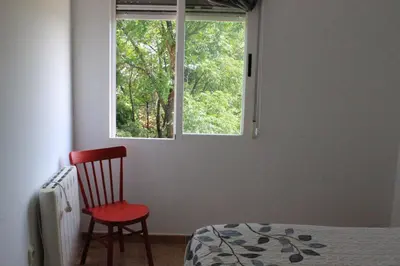 Cama o camas de una habitación en Apartamentos el Cardenillo