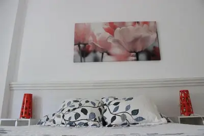 Cama o camas de una habitación en Apartamentos el Cardenillo